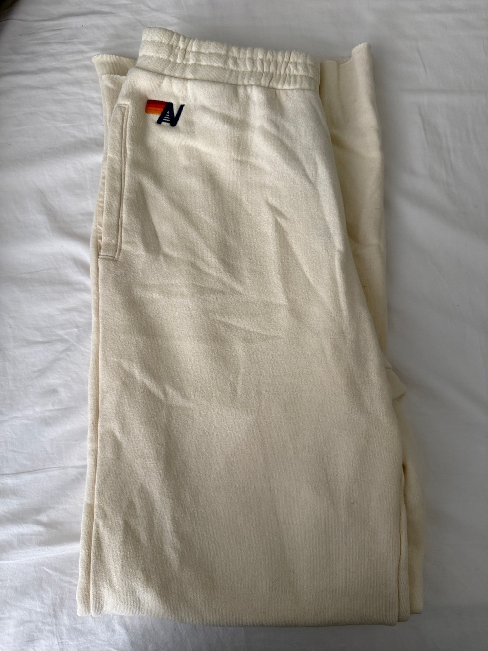 Cream bootcut Aviator Nation sweatpants  with Small Embroidered logo